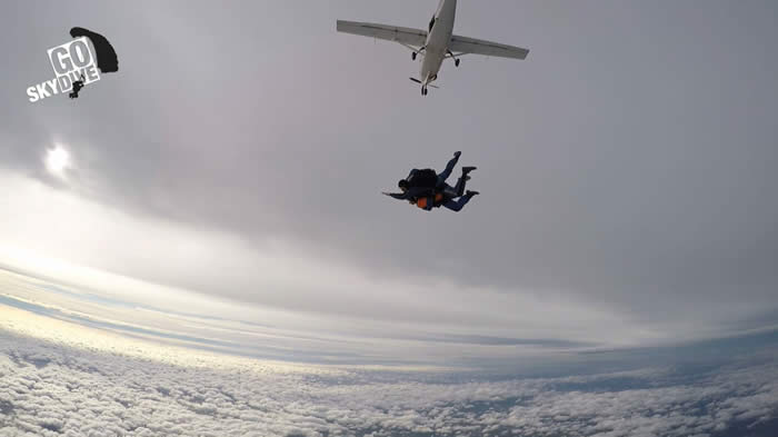 Tanya jumping out of the plane from 15,000 feet